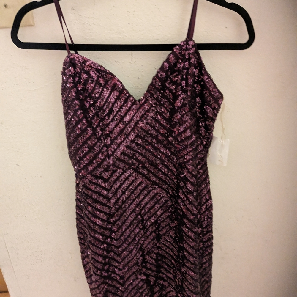 Purple sequin size large junior size dress . NWT .
